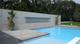 Geometric Pool and Spa with tanning ledge