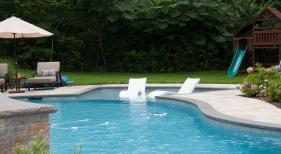Freeform pool with tanning ledge