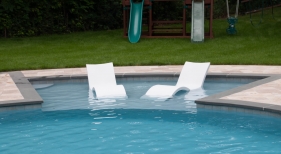Pool with tanning ledge