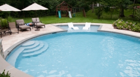 Freeform pool with tanning ledge